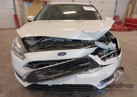 2015 Ford Focus Titanium z USA, uszkodzony, nr VIN 1FADP3J27FL280611